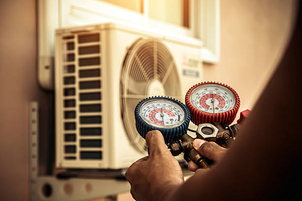 Professional Hvac technician working in Hardin, MT
